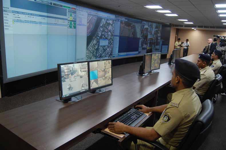 Police officers monitoring CCTV footage in a surveillance control room before successfully locating a missing girl and reuniting her with her family.